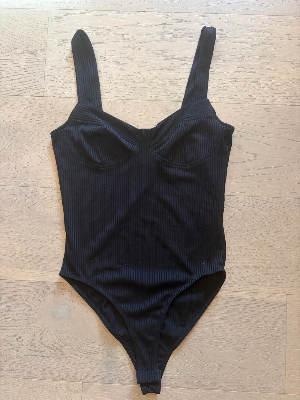 Forever 21 Black Ribbed One-Piece Bodysuit with Structured Bust Detail